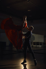Passion dance couple, woman jumping