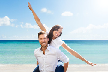 Beautiful Young Couple At Beach