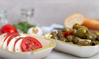 Caprese salad mozzarella with tomatoes and olives