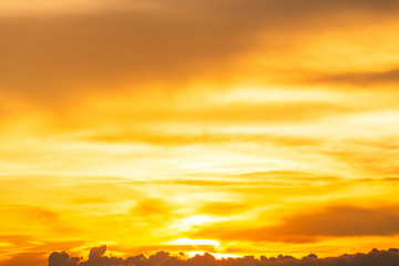 Orange sky background texture with white clouds sunset.