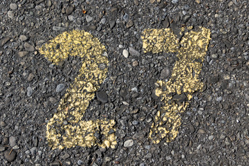 symbol of number sign painted on asphalt
