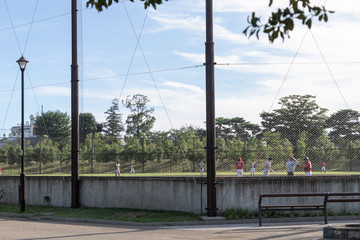 baseball game played in ball park at japanese park