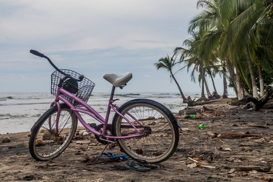 Bicycle on a beach in Puerto Viejo de Talamanca village, Costa Rica