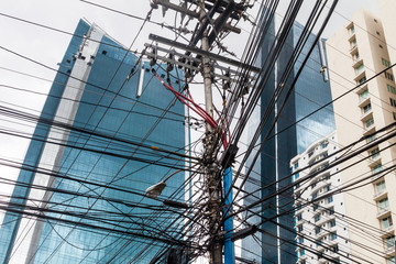 Chaos of electric cables and high rise buildings in Panama City