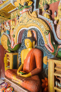 Buddha image in Embekka Devalaya (Embekke Devale) temple near Kandy, Sri Lanka