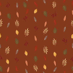 Fototapeta na wymiar Seamless pattern from autumn fallen leaves on a orange background. Warm