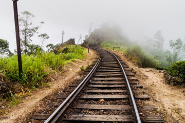 Fototapeta na wymiar Railway tracks near Idalgashinna, Sri Lanka