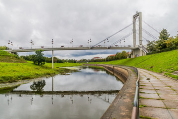 Fototapeta premium Pedestrian bridge over Nemunas river in Kaunas, Lithuania.