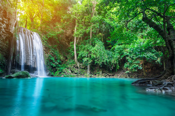 Erawan waterfall in tropical forest of national park, Thailand 