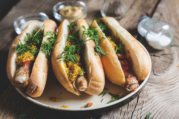 Hot dogs with mustard and chopped dill