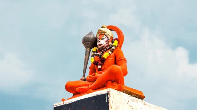Hindu god Hanuman magically praying.  Hindu God Hanuman idol, Particles animation, 