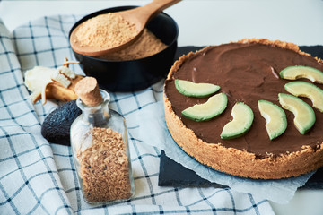 Fototapeta na wymiar Raw vegan chocolate avocado and banana cake