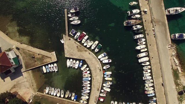 Aerial, vertical - Small port with moored boats