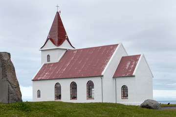 Fototapeta na wymiar Ingjaldshólskirkja red roof church near Hellissandur 