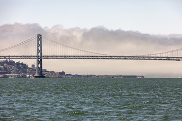 The San Francisco Bay Bridge with a glimpse of the city