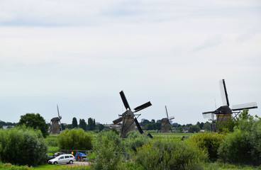 Fototapeta premium Kinderdijk, Netherlands - Windmills along the canals of the UNESCO World Heritage Kinderdijk