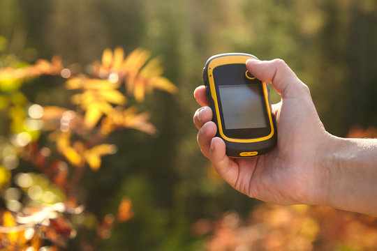 Tourist Holding Gps Tracker. Finding Right Way.