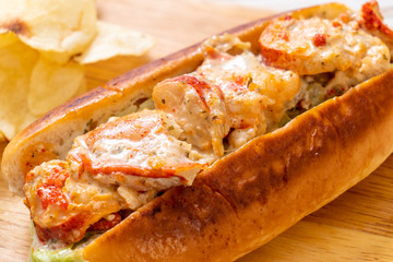 homemade lobster roll with potato chips