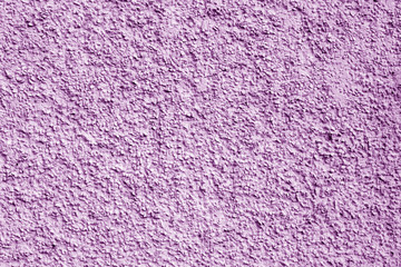 Concrete wall background in purple color.