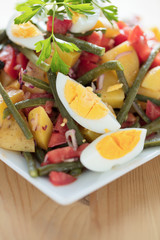 bowl of healthy salad on white background
