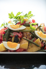 bowl of healthy salad on white background