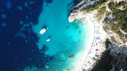 Aerial drone photo of iconic paradise sandy beach of Agiofili near port of Vasiliki with emerald crystal clear sea and sail boats docked, Lefkada island, Ionian, Greece