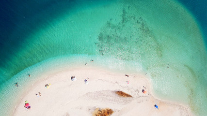 Aerial drone photo of tropical caribbean bay with white sand beach and beautiful turquoise and...