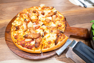 closeup fresh Italian Pizza on Wooden Tray on wooden table , Traditional pizza .