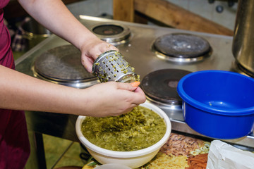 a dish is cooked in the kitchen