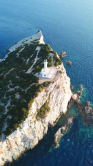 Aerial drone bird's eye view photo of iconic lighthouse in Cape Lefkada the Southest part of the island, Ionian, Greece