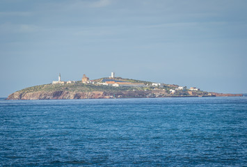 Saaidia island and waves and rocks