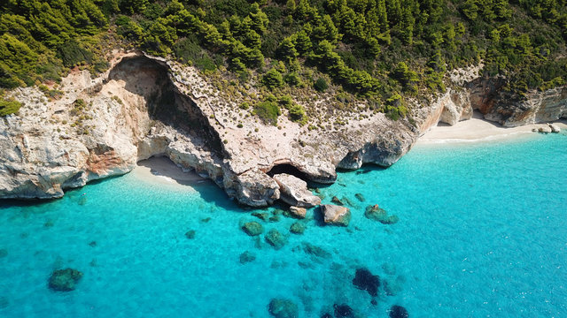 Aerial drone bird's eye view photo of small rocky beach next to iconic beach of Milos and Agios Nikitas in island of Lefkada, Ionian, Greece