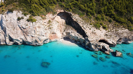 Aerial top view photo of tropical sandy exotic emerald paradise beach