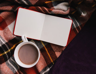 Red plaid, a Cup of hot cocoa, sketchbook, winter comfort