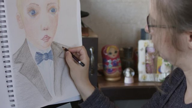 Woman Colouring A Portrait