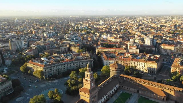 Aerial panoramic view of cityscape of Milan, historic medieval fortress Sforza Castle and Sempione Park, landscape panorama of Italy from above, Europe