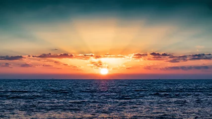 Selbstklebende Fototapeten sunset over the sea © Igor