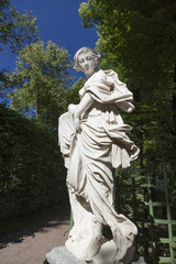 Fototapeta premium Statue from the collection of marble sculptures by Italian masters of the late XVII - early XVIII centuries in the Summer Garden in St. Petersburg