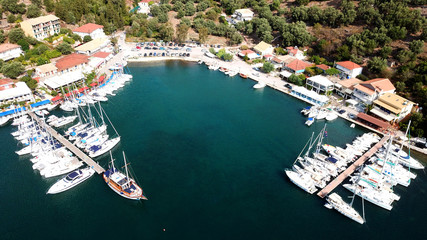 Aerial drone photo of famous seaside village and bay of Sivota Lefkadas famous for trips to nearby beaches and dafe harbouring to sail boats, Lefkada, Greece