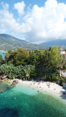 Fototapeta premium Aerial drone bird's eye view photo of iconic port of Nidri or Nydri a safe harbor for sail boats and famous for trips to Meganisi, Skorpios and other Ionian islands, Leflkada island, Ionian, Greece