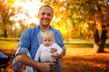 Portrait of happy family - Father with his son spending time in the park