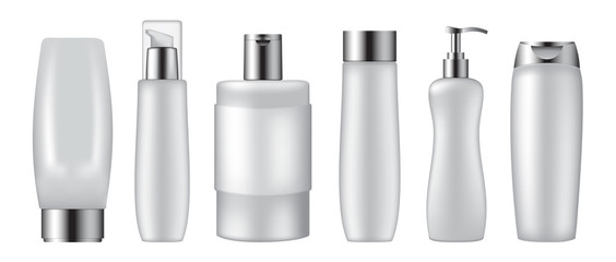 Set of cosmetic bottles on white background