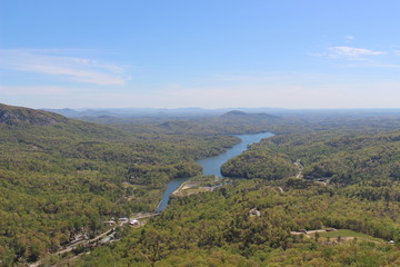 lake lure in between the woods