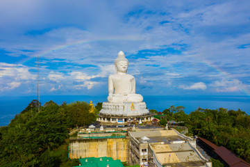 Fototapeta na wymiar areial view amazing rainbow cover Phuket big Buddha..Phuket Big Buddha is one of the island most important and revered landmarks on the island.