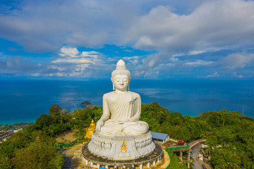 Obraz premium areial view white cloud in blue sky at Phuket big Buddha. .Phuket Big Buddha is one of the island most important and revered landmarks on the island.