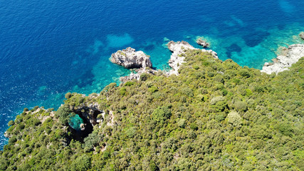 Aerial drone bird's eye view photo of iconic paradise sandy beaches with turquoise sea in complex islands of Agios Nikolaos and Mourtos in Sivota area, Ionian sea, Epirus, Greece