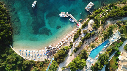 Aerial drone bird's eye view photo of iconic paradise sandy beaches with turquoise sea in complex islands of Agios Nikolaos and Mourtos in Sivota area, Ionian sea, Epirus, Greece