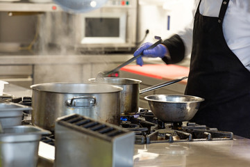Work surface and kitchen equipment
