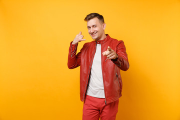 Portrait vogue smiling handsome young man 25-30 years in red leather jacket, t-shirt standing...