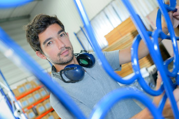 young man with earmuffs